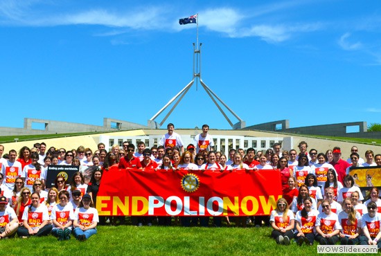 Australian Rotaractors, Rotarians, and Interactors gather outside Parliament House in Canberra in support of the global effort to eradicate polio.